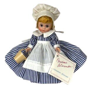 Madame Alexander restrung 8" Little Miss doll with stand.